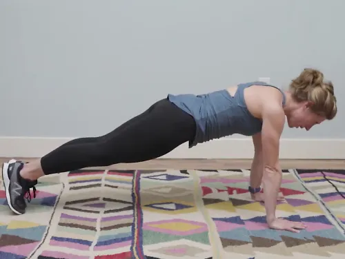 A runner demonstrates how to do a push-up